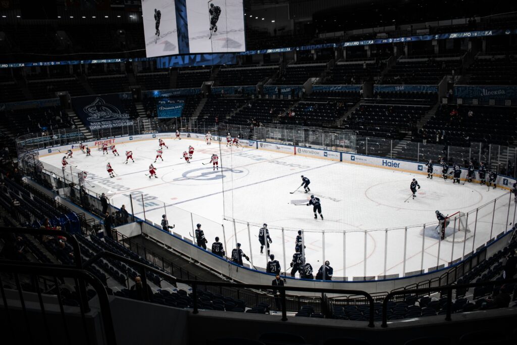 Photo by <a href="https://unsplash.com/@klim11?utm_source=unsplash&utm_medium=referral&utm_content=creditCopyText">Klim Musalimov</a> on <a href="https://unsplash.com/photos/people-playing-ice-hockey-on-ice-stadium-RN5Op_v8J4U?utm_source=unsplash&utm_medium=referral&utm_content=creditCopyText">Unsplash</a>